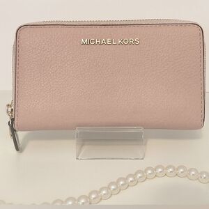 Michael Kors Pink Jet Set Zip around Wallet clutch 
Pebble Leather